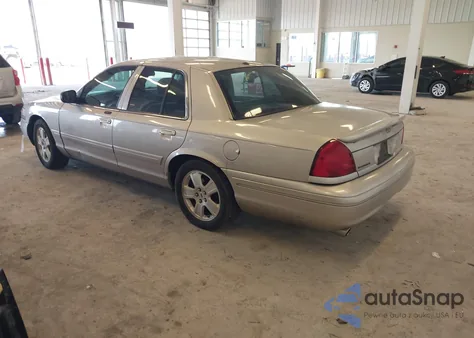 2004 Ford Crown Victoria Lx z USA, uszkodzony, nr VIN 2FAFP74W44X145987